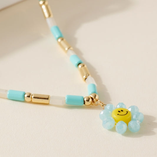 Avenue Zoe Smiley Face Flower Pendant Necklace - Blue