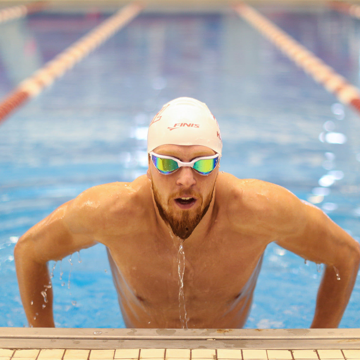 Why do swimmers wear cheap mirrored goggles